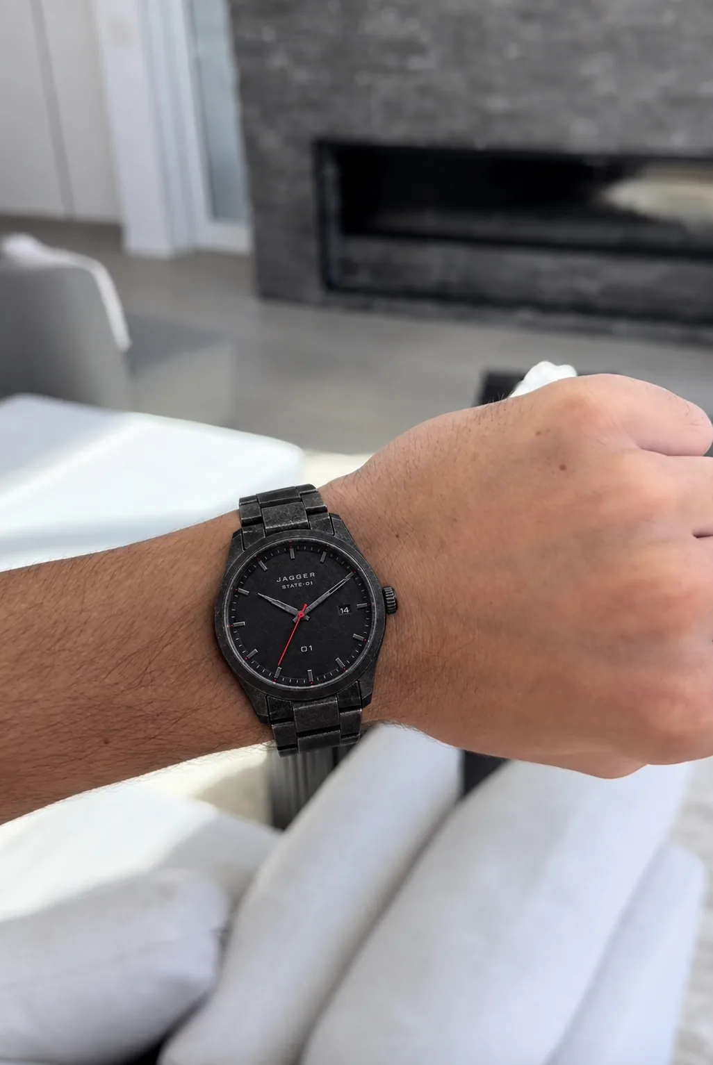 STATE-01 worn on a wrist in a bright room
